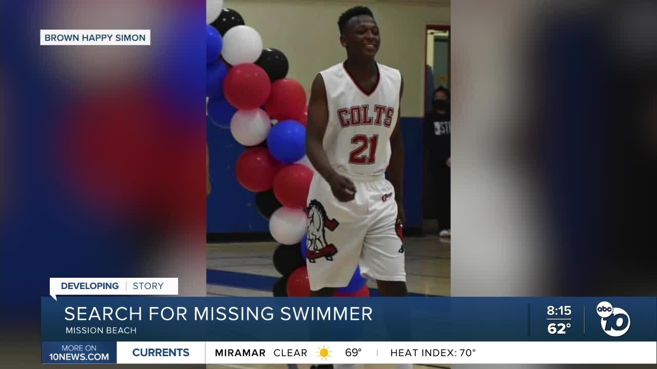 Loved ones create makeshift memorial for 18-year-old missing swimmer