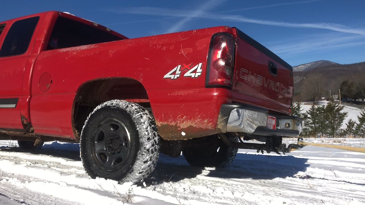 Chevy Silverado Tows Jetski Seadoo In Snowy Pasture