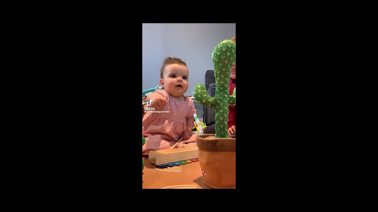 Baby has in depth conversation with taking cactus 🌵 toy viral hog