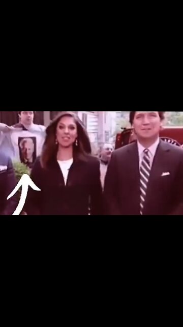 Watch Tucker's Reaction To Protestor Who Said 'Bill Clinton Is A Rapist'