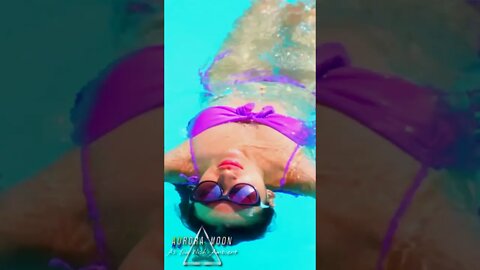 ASIAN BIKINI MODEL SWIMMING AND SUNBATHING AT THE HOLIDAY POOL