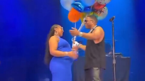 Ashanti surprised Nelly during his performance for Father's Day