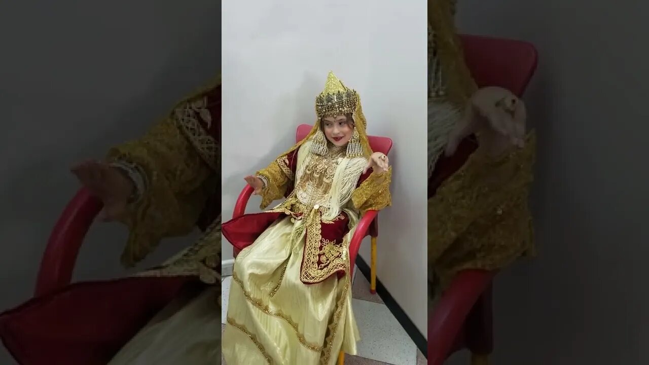 Kenza tries on traditional wedding clothes in Tlemcen, Algeria