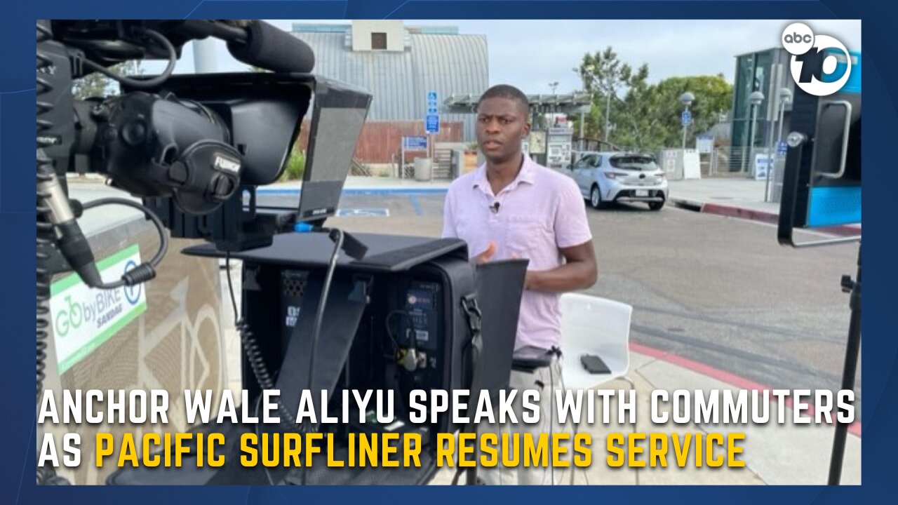 Wale Aliyu speaks with commuters as Pacific Surfliner resumes service