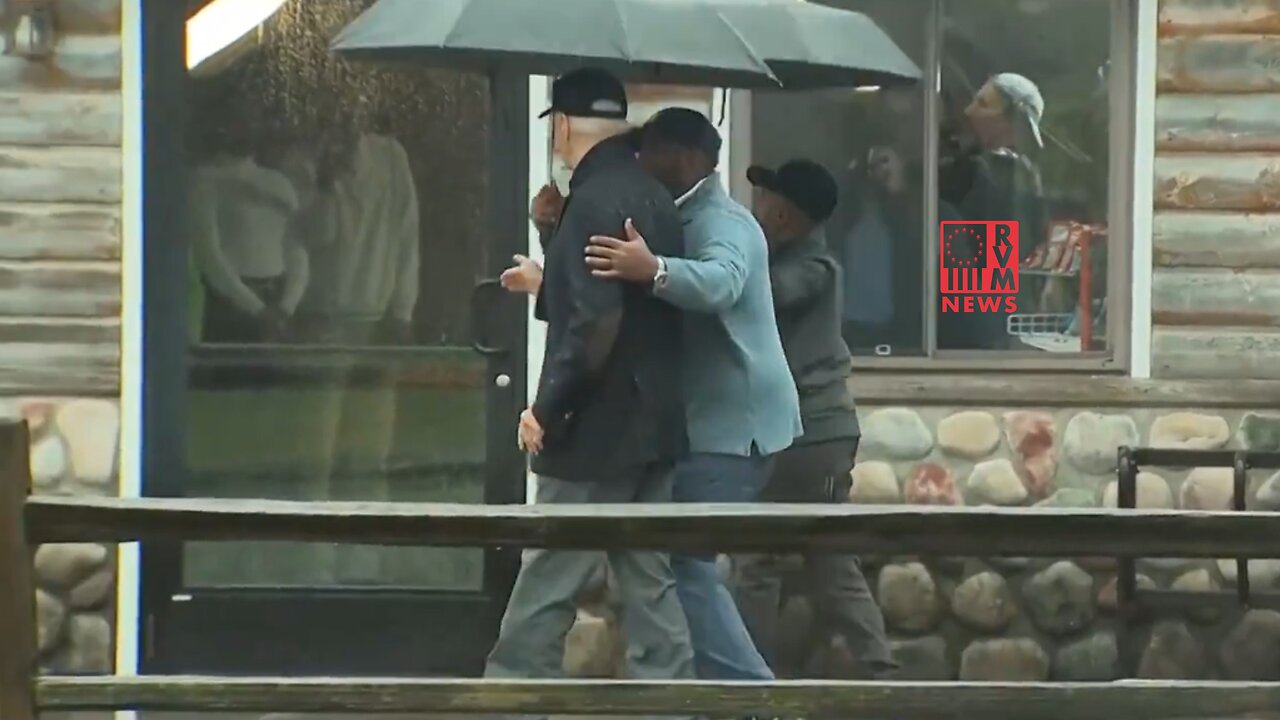 National Embarrassment Joe Biden Lost In The Rain, Handler Shows Him The Way