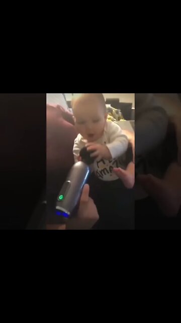 Cute adorable baby child with warm white and pink hat with cute baby girl