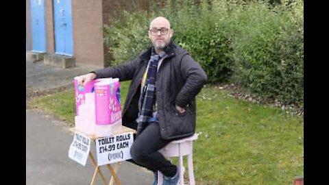 Man sells toilet paper on the streets