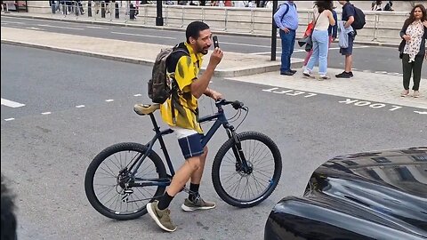 Biker stops traffic to get his phone back #horseguardsparade