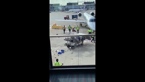 WATCH: Driverless American Airlines cart spins out of control on airport tarmac