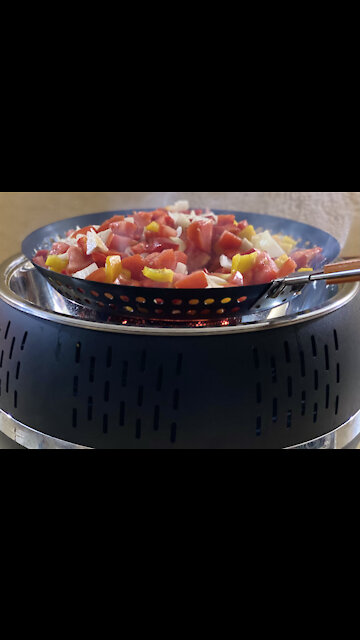 Charcoal BBQ grill for preparing food on the table while hanging out with family and friends