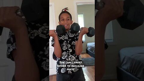 Son challenges father to shoulder press
