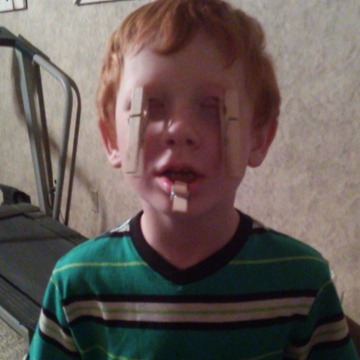 Young Boy Tries Clothespin Challenge