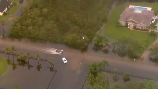 Some roads remain impassable Friday in Jupiter Farms due to flooding