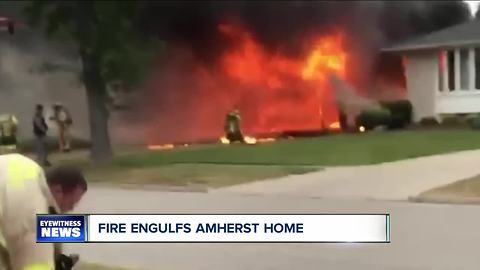 Fire engulfs Amherst home