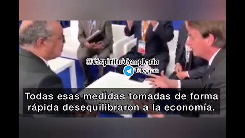 El presidente de Brasil, Bolsonaro, preguntando al director de la OMS, Tedros.