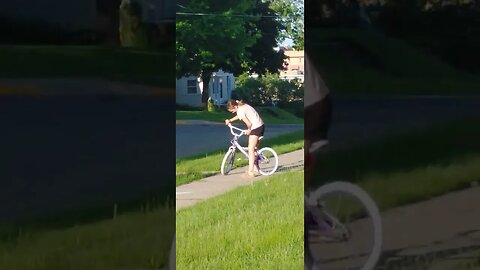 Shy baby gets a big girl bike