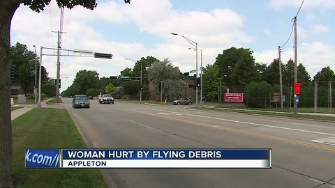 Woman hit by flying debris in Appleton