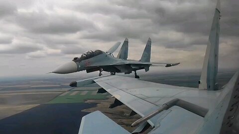 Approach to the runway and landing of a pair of Russian Sukhoi Su-30SM multirole fighters.