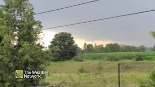 'That's a full on spin,' tornado forms in the distance