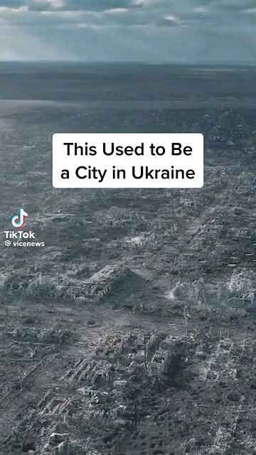 Memories of the City of Eukraine" VD (Visual Description): A faded photograph showing the once