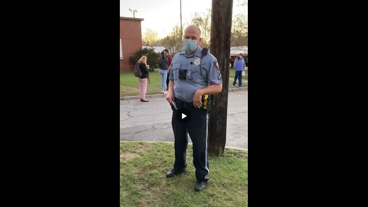 Liberal cop threatens a voter with arrest for wearing a MAGA cap