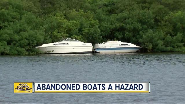 Dozens of abandoned boats are littering Tampa Bay waterways