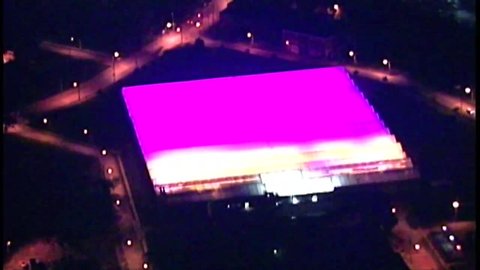 From above: Green City Growers Greenhouse give off a purple light in the sky