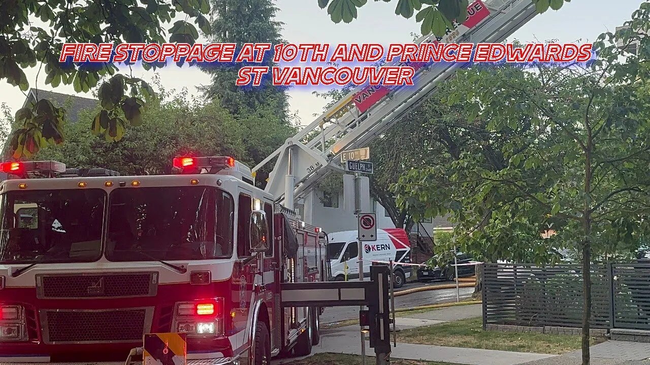 Fire fighters hard at working shooting water at low rise apartment at 10th and Prince Edwards St