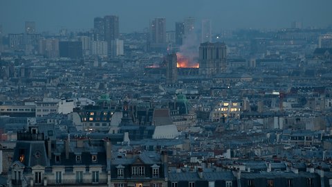 Witnesses Watch As Notre Dame Burns