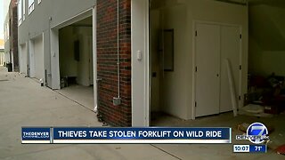 Teens steal forklift and ram Denver town homes