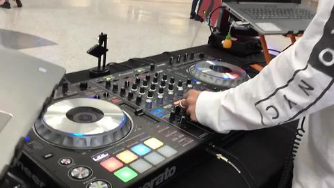 Student DJs perform for EDC arrivals