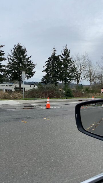 Cables going under manholes in Redmond, Washington