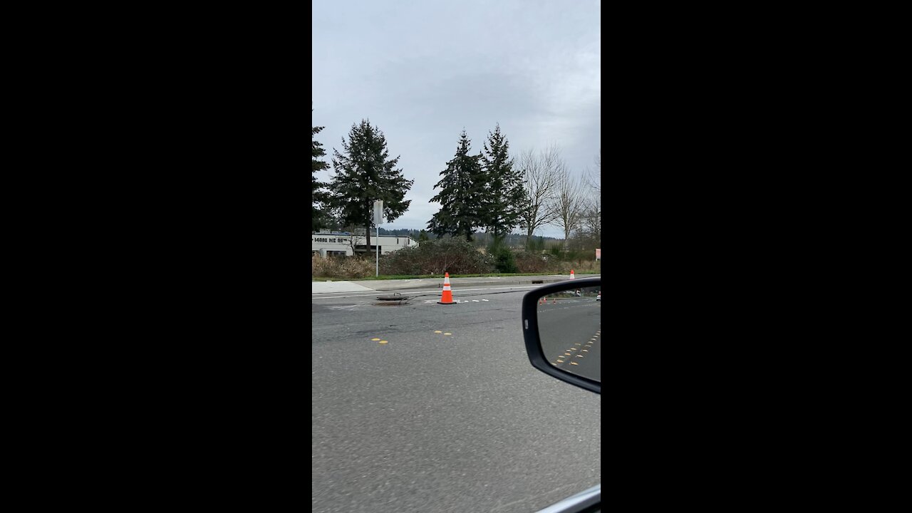 Cables going under manholes in Redmond, Washington