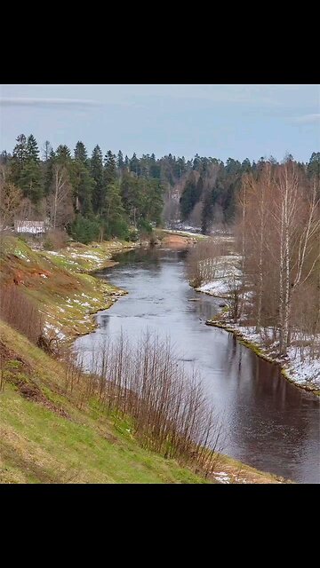 Footage after the April snowfall in the Leningrad region, view of the Oredezh River