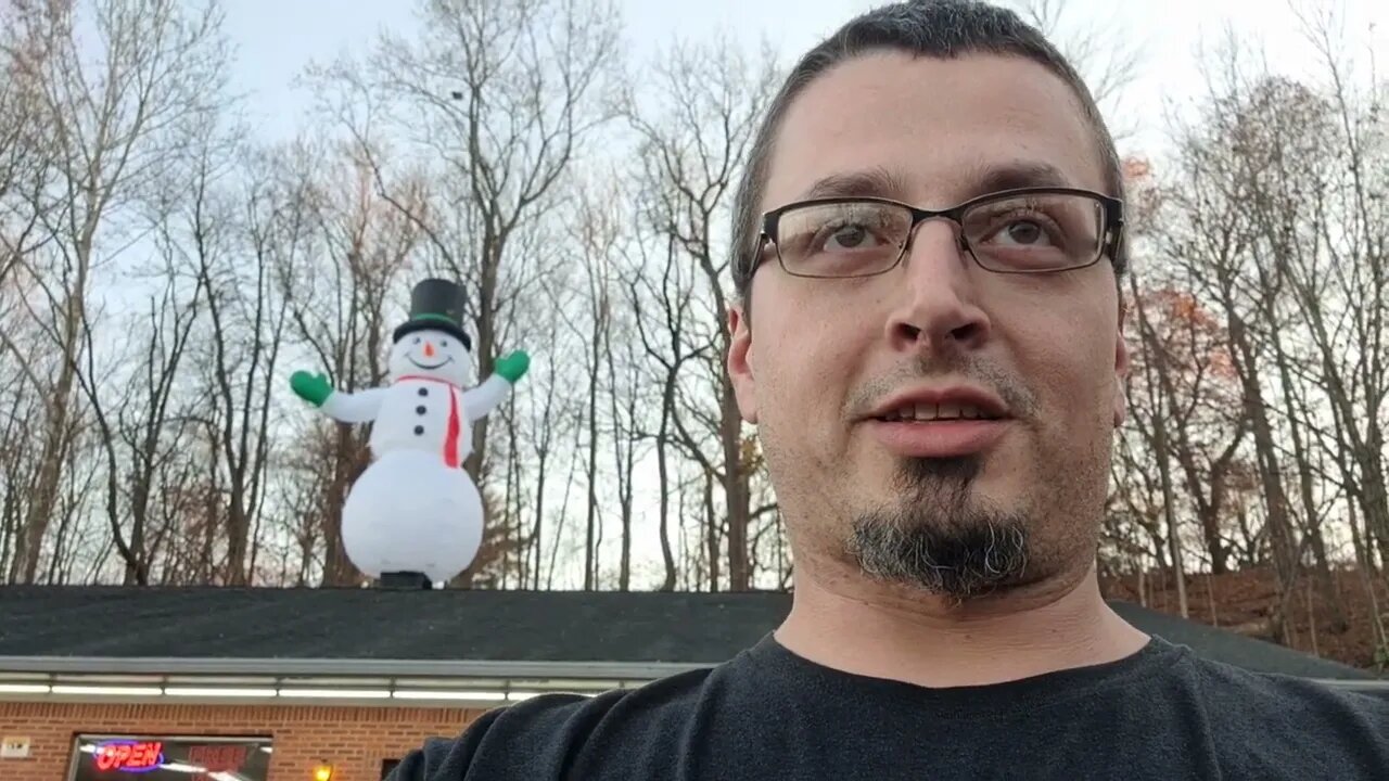 Working at a Laundromat is easy?!?!? 20 ft inflatable snowman!