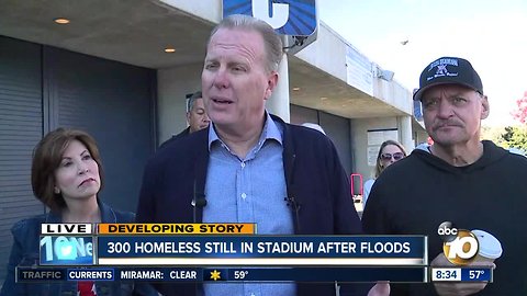 San Diego Mayor visits with homeless evacuated by flooding