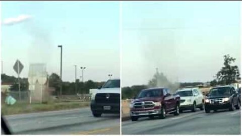 Dust Devil crosses the road