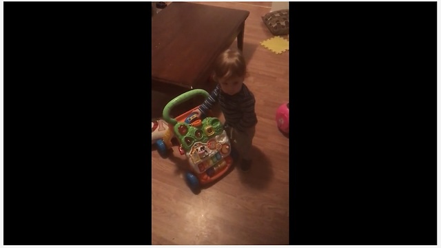 Baby Boy Loves To Dance To The Music Of His Walker