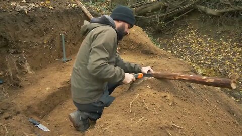 Building complete and warm survival shelter | Bushcraft earth hut, grass roof & fireplace with cla-9