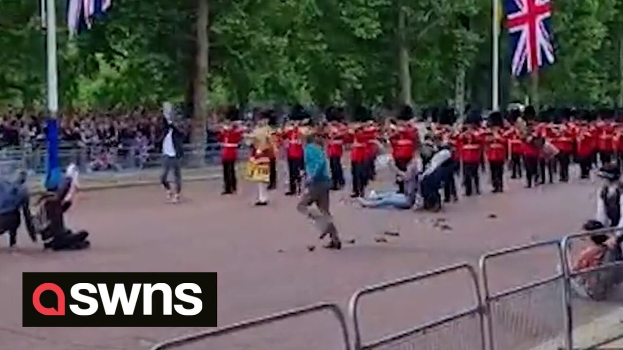 Queen’s jubilee parade shows protesters storming onto the Mall before being dragged away by police