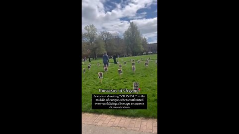 A student at Oregon University takes out signs of the Israeli hostages in solidarity