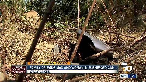 Families grieve two found in submerged car