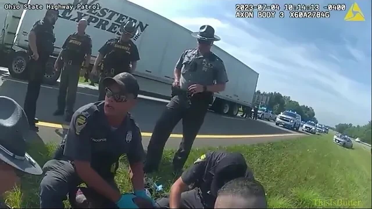 Ohio police K-9 dog attacks truck driver with his hands up (police body cam footage)