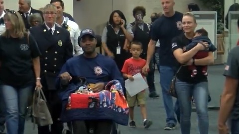 Local firefighter receives hero's welcome