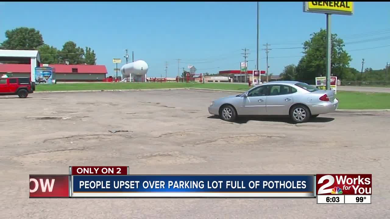 Keys residents upset over parking lot full of potholes