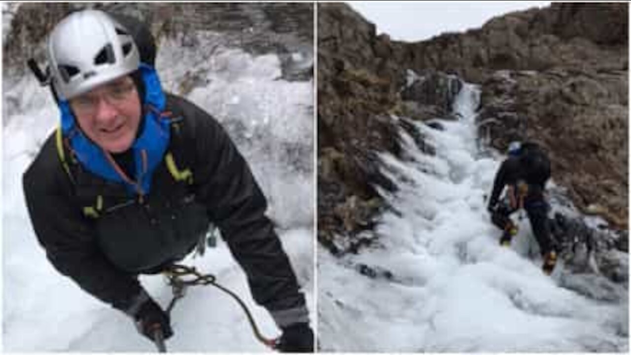 Alpinisti scalano una cascata congelata in Galles