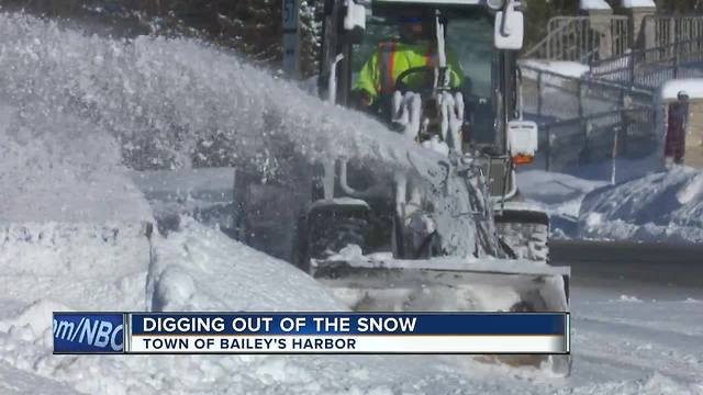 Cleaning up after heavy snow in Door County