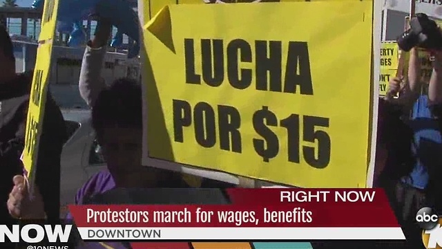 Protestors march for wages, benefits