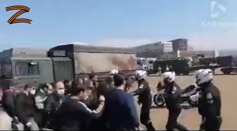 Greek civilians intercept a NATO weapons convoy on the way to fight Russia