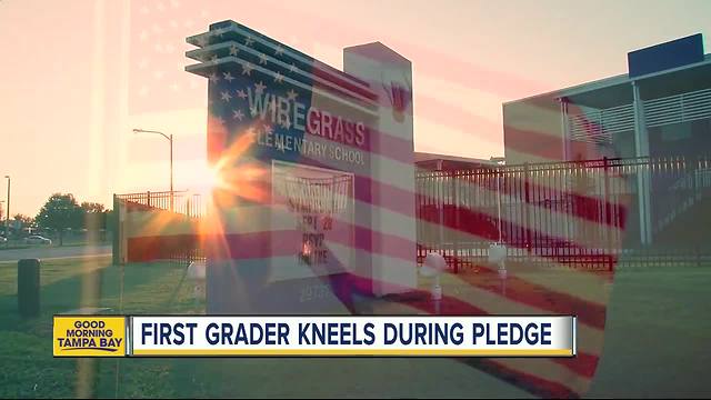 First grader kneels during Pledge of Allegiance